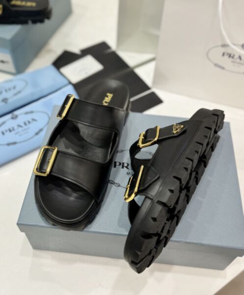 Prada Women's Leather St<p>These leather slides with a casual style are defined by clean